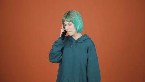 Young-woman-getting-bad-news-on-the-phone-gets-upset.
